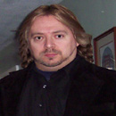 adamheadsmall.jpg